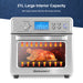 Air fryer oven with a roast chicken inside. 21 Large interior capacity. With large interior that fits 4 lb whole chicken.
