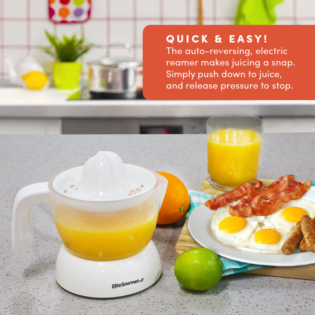 QUICK & EASY! The auto-reversing, electric reamer makes juicing a snap. Simply push down to juice, and release pressure to stop. Citrus Orange Juicer with breakfast foods in the kitchen.