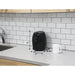 Air fryer placed on countertop. Dimension is 11"H x 8"L x 9.75"W.
