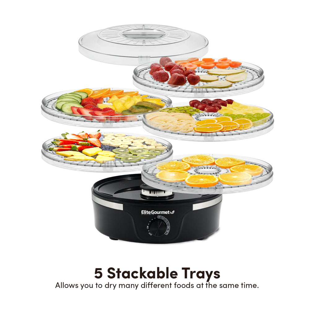 5 Stackable Trays Allows you to dry many different foods at the same time. Image showing food dehydrator trays with sliced fresh fruits.