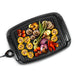 Top view of Elite Gourmet Non-Stick Electric Indoor Grill with meat and vegetable.