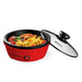 8.5" Electric Skillet with Glass Lid set to side and scrambled eggs and sausages cooking inside pan.