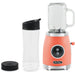 Retro Mason Jar Personal Blender (Coral) with water bottle.
