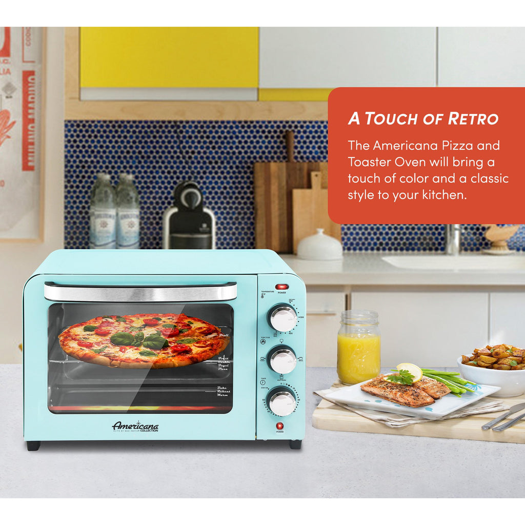 A touch of retro.  The americana pizza and toaster oven will bring a touch of color and a classic style to your kitchen.  Toaster Oven on kitchen counter next to a plate of baked salmon, juice and roasted potatoes.