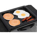 Top grill & griddle with pancakes, eggs, and sausages on top.