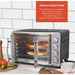 FRENCH DOOR OVEN The Elite Platinum Countertop Oven with Convection & Rotisserie boasts full-size oven performance in compact, energy-efficient form.