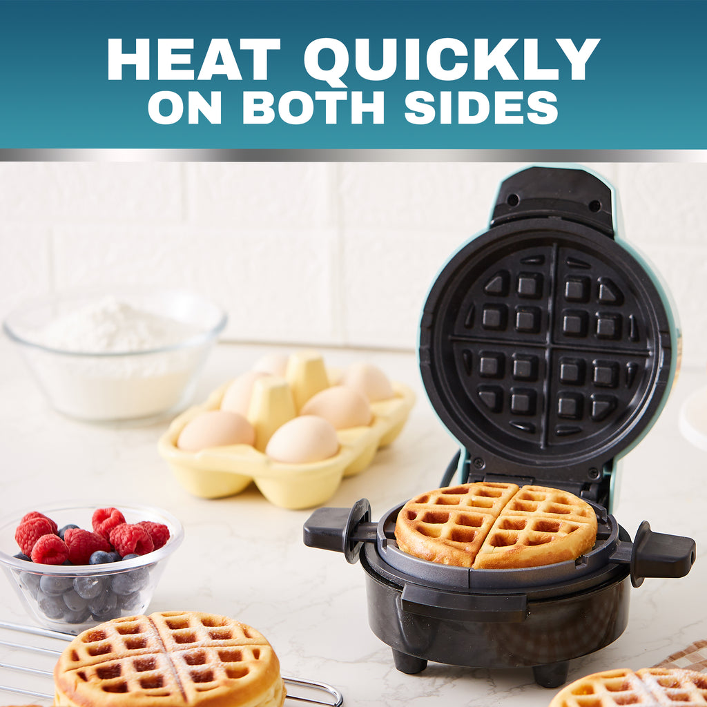 HEAT QUICKLY ON BOTH SIDES. Image  showing 5" Fluffy Stuffed Nonstick Waffle Maker with eggs, wheat, berries and stuffed waffle.