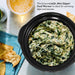 Spinach & Artichoke dip inside slow cooker pot.  The bonus 0.75Qt. Mini Dipper Food Warmer is ideal for warming dips and sauces.