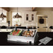 5 Qt. Dual Tray Stainless Steel Buffet Server Food Warmer on the counter top of a modern kitchen.