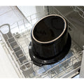 Inner ceramic pot placed inside a dishwasher rack.
